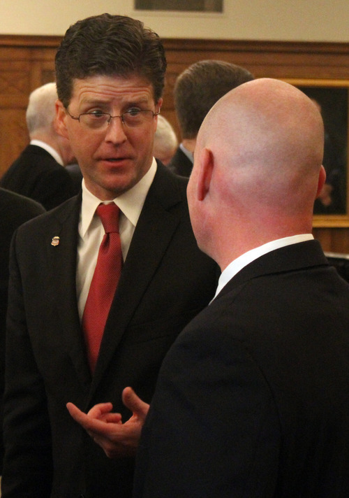 Rick Egan  | The Salt Lake Tribune 

David B. Barlow visits with friends and relatives after his investiture ceremony as a new U.S. Attorney, in Judge Benson's courtroom in the Frank E. Moss U.S. Courthouse, Friday, December 9, 2011.