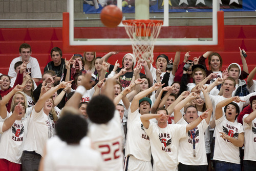 Trent Nelson  |  The Salt Lake Tribune
Judge fans try to distract East's Vaha Vainuku (22) on the free throw line as East faced Judge Memorial High School boys' basketball in Salt Lake City, Utah, Wednesday, December 7, 2011.