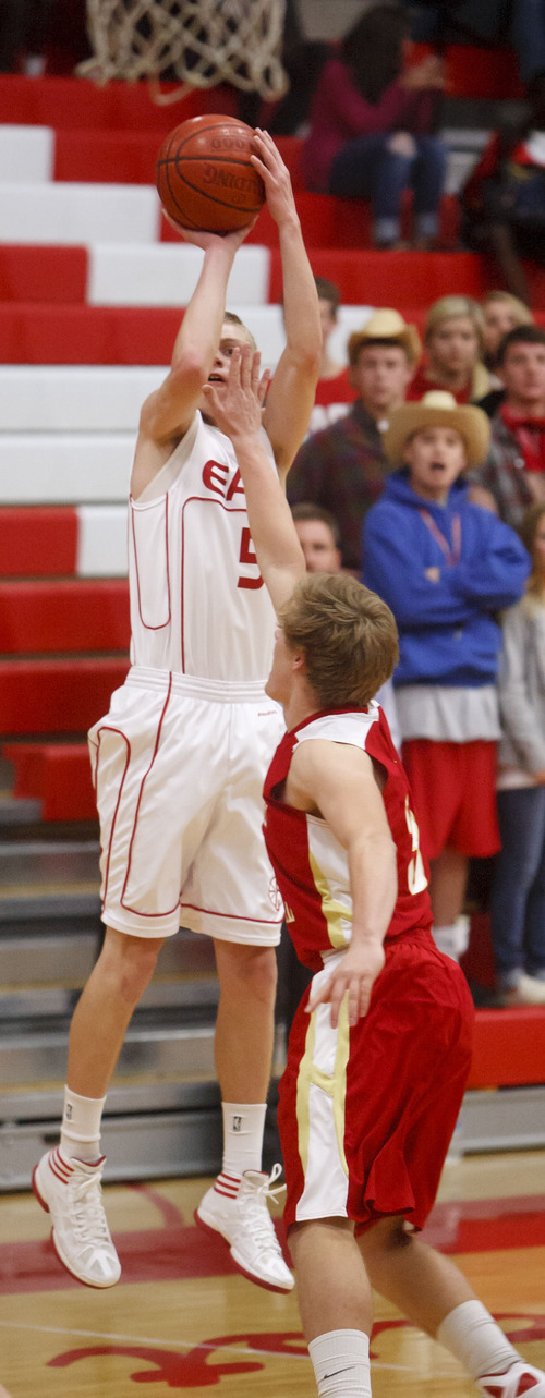 Trent Nelson  |  The Salt Lake Tribune
East's Parker Van Dyke (5) shoots over Judge's Patrick Neville (31) as East faced Judge Memorial High School boys' basketball in Salt Lake City, Utah, Wednesday, December 7, 2011.