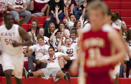 Trent Nelson  |  The Salt Lake Tribune
Judge fans fall back into each other after their team scored a three pointer as East faced Judge Memorial High School boys' basketball in Salt Lake City, Utah, Wednesday, December 7, 2011.