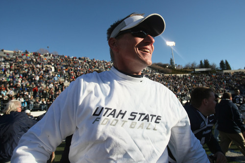 Chris Detrick  |  The Salt Lake Tribune
Utah State head coach Gary Andersen celebrates after winning the game at Romney Stadium Saturday November 26, 2011. Utah State defeated Nevada 21-17 and will be bowl-eligible for the first time since 1997.