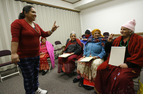 Francisco Kjolseth  |  The Salt Lake Tribune
English instructor Divya Acharya hears the days of the week and months of the year as Bhutanese refugees attend a weekly English and citizenship class at an LDS wardhouse on 300 East and 2300 South on Saturday. Doctors have identified a B12 vitamin deficiency in newly arriving Bhutanese refugees due to their poor diet in refugee camps over decades. The vitamin deficiency can lead to neurologic disorders. Now doctors are trying to encourage the newcomers to take vitamins and eat better.