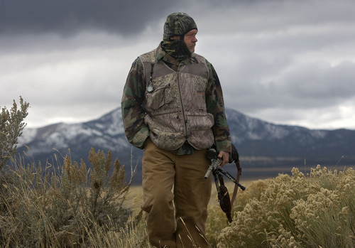 Al Hartmann  |  The Salt Lake Tribune
Bill Keebler specializes in guiding coyote hunters. He often hunts the basins and mountain ranges west of his home in Vernon. The wide open terrain makes it impossible to come up on a coyote, so he lures them with reed and electronic calls.