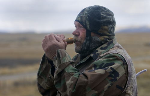 Al Hartmann  |  The Salt Lake Tribune
Bill Keebler is a guide and outfitter who specializes in coyote hunting. He uses reed callers to lure the coyotes to him. He can make over 100 distinct calls that communicate to the animals.