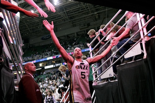 Djamila Grossman  |  The Salt Lake Tribune

The Utah Jazz' Devin Harris (5) walks off the court after his team won against the Denver Nuggets during the second half of a game at Energy Solutions Arena in Salt Lake City, Utah, on Wednesday, April 13, 2011.