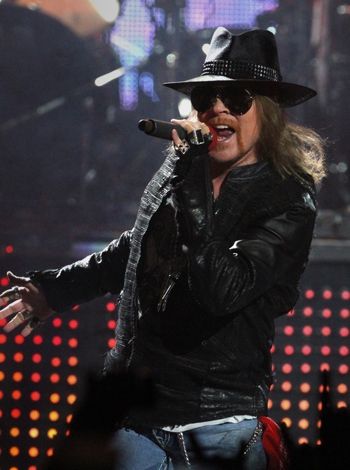 Rick Egan  | The Salt Lake Tribune 

Axl Rose, lead vocals for Guns  N' Roses performs with his band at the Maverick Center, late Tuesday, December 13, 2011.