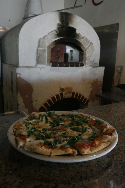 Rick Egan  | The Salt Lake Tribune 

Margherita pizza at Michelangelo Ristorante, at the original location on Highland Drive, Friday, Dec. 9, 2011.