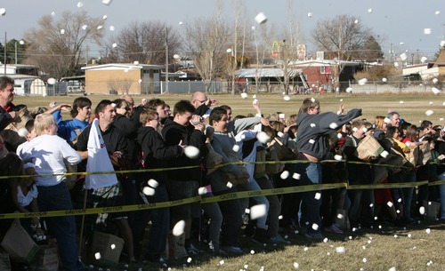 Steve Griffin  |  The Salt Lake Tribune

Hundreds of students at Eisenhower Junior High School try to set a new world record for the World's Largest Marshmallow Fight by throwing or tossing nearly 2,000 pounds of 140,000 regular-sized marshmallows in about 15 minutes.in Taylorsville, Utah Friday, December 2, 2011.