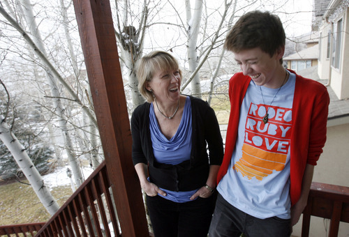 Francisco Kjolseth  |  The Salt Lake Tribune
Vicki Whiting, a professor of management at Westminster College's Gore School of Business, jokes around with her son Kevin at their home in Jeremy Ranch on Tuesday, December 13, 2011. Whiting has written a book about her travails diagnosing her son Kevin, 17, with a mysterious illness as she navigated the health care system to find the best care for her son. In addition to its therapeutic value for Whiting, the book has been adopted as a manual for patient care by many Utah health-care providers.
