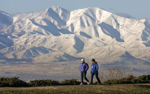 Al Hartmann  |  The Salt Lake Tribune
Brigitte Klement, left, and Sarah Lehmann take their morning walk at 11th Avenue Park high in Salt Lake's Avenues with the snowy Oquirrh Mountains in the distance. Just because it's cold doesn't mean to cut back on hydration when excercising in the winter.