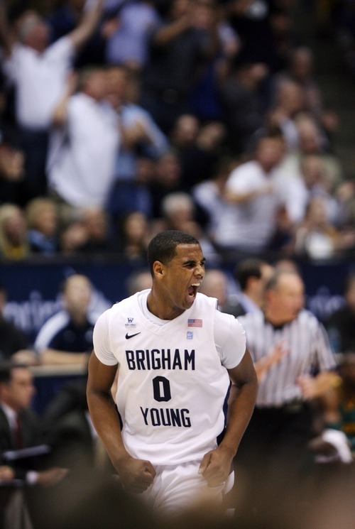 Steve Griffin  |  The Salt Lake Tribune

BYU's Brandon Davies screams with excitement as BYU pulls away from Baylor during frist half action of the BYU Baylor basketball game  in Provo, Utah Saturday, December 17, 2011.