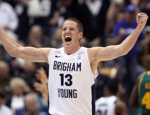 Steve Griffin  |  The Salt Lake Tribune

BYU's Brock Zystra holds his fists in the air and screams with excitement as BYU pulls ahead of Baylor during frist half action of the BYU Baylor basketball game  in Provo, Utah Saturday, December 17, 2011.