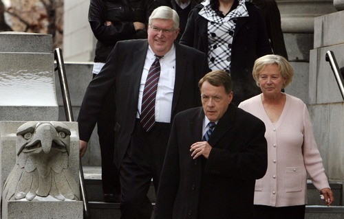 Steve Griffin  |  The Salt Lake Tribune

Dewey C. MacKay holds hands with his wife, Kathleen MacKay, as they leave the Frank E. Moss U.S. Courthouse in Salt Lake City on Monday Dec. 19, 2011, following sentencing hearing for charges related to prescribing more than 1.9 million hydrocodone pills and nearly 1.6 million oxycodone pills between June 1, 2005, and Oct. 30, 2009. His attorney Peter Stirba is in front.