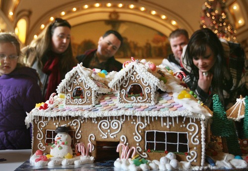 Kim Raff I The Salt Lake Tribune
People admire a gingerbread house at the Holiday Gingerbread Festival on Saturday. More than 50 gingerbread houses were on display at Union Station at The Gateway in Salt Lake City. The festival is a fundraiser for the United Way of Salt Lake Neighborhood Centers.