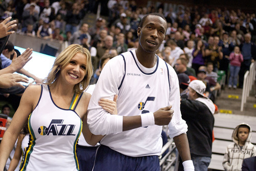 Jeremy Harmon  |  The Salt Lake Tribune

Utah's Josh Howard is escorted onto the court by one of the Jazz dancers prior to a scrimmage at EnergySolutions Arena in Salt Lake City, Saturday, Dec. 17, 2011.