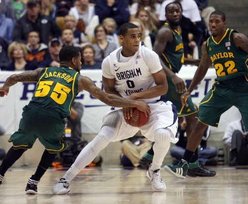 Steve Griffin  |  The Salt Lake Tribune

 After blocking Brandon Davies last second shot Baylor's  Pierre Jackson gets his hand on he ball preventing BYU's Brandon  Davies from taking another shot as time expires giving Baylor the win at the Marriott Center in Provo, Utah Saturday, December 17, 2011.