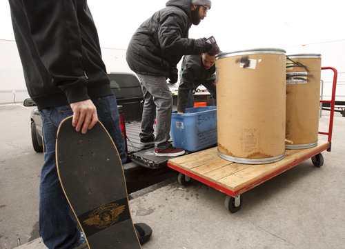 Trent Nelson  |  The Salt Lake Tribune
Skate4Homies and YuR Designs of Murray pulled together more than 100 skateboarders to collect food. The two organizations dropped off the donations this week at the Utah Food Bank in Salt Lake City. Nate Ure, left, holds a skateboard while Todd Ingersoll and Griffin Kearns unload donations.