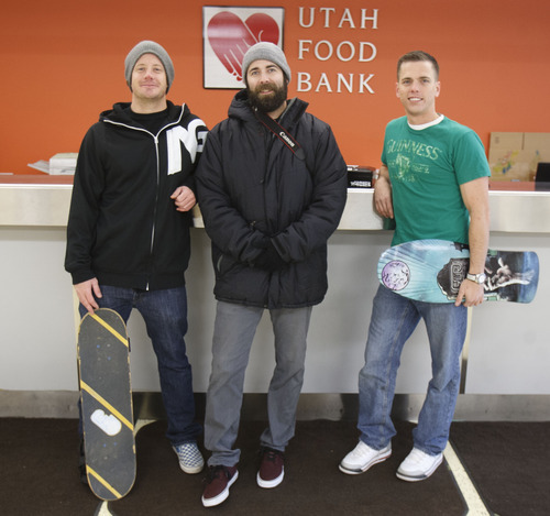 Trent Nelson  |  The Salt Lake Tribune
Nate Ure, Todd Ingersoll and Griffin Kearns, from left to right, were instrumental in pulling together more than 100 skateboarders to collect food as part of a joint holiday campaign between Skate4Homies and YuR Designs of Murray. The two organizations dropped off the food this week at the Utah Food Bank in Salt Lake City.