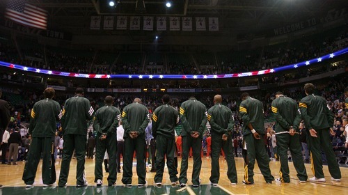 Steve Griffin  |  The Salt Lake Tribune

The Utah Jazz stand as during the singing of the National Anthem prior to the start of their game against the  Portland Trail Blazers at EnergySolutions Arena in Salt Lake City, Utah Wednesday, December 21, 2011.