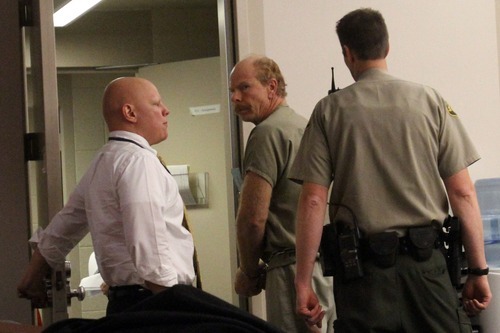 Rick Egan  | The Salt Lake Tribune 

Daniel Folsom, charged with murder in the beating death of girlfriend Alicia Sherman, leaves courtroom after his initial appearance in 3rd District Court in Salt Lake City on Thursday.