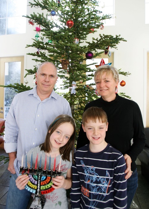 Kim Raff | The Salt Lake Tribune
Miriam Eatchel is Jewish and her husband, Bruce Eatchel, is Christian. They are raising their kids, Max and Madeleine, Jewish, but they observe some Christmas traditions.