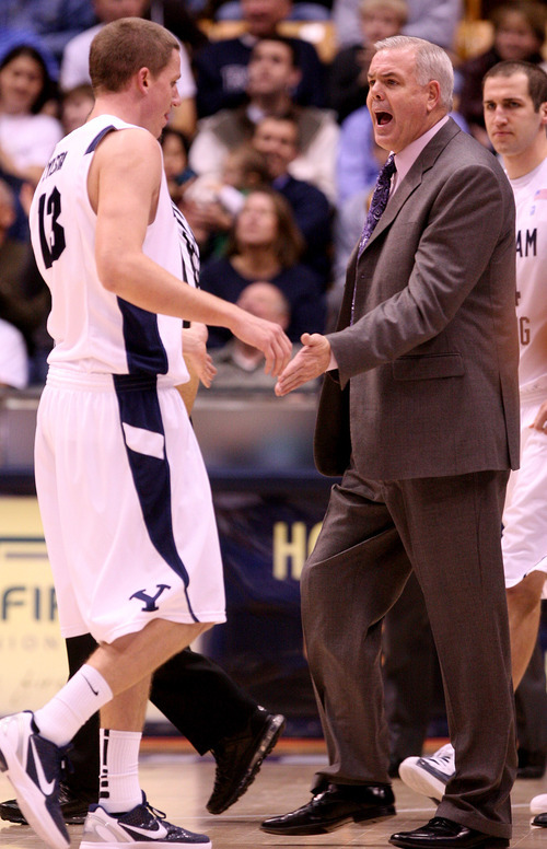Leah Hogsten | The Salt Lake Tribune  
BYU's BYU forward Brock Zylstra (13) is congratulated by head coach Dave Rose. Zylstra scored 14 points. Brigham Young University Cougars men's basketball team leads the Buffalo Bulls  47-39 in the first half Tuesday, December 20, 2011 at the Marriott Center.
