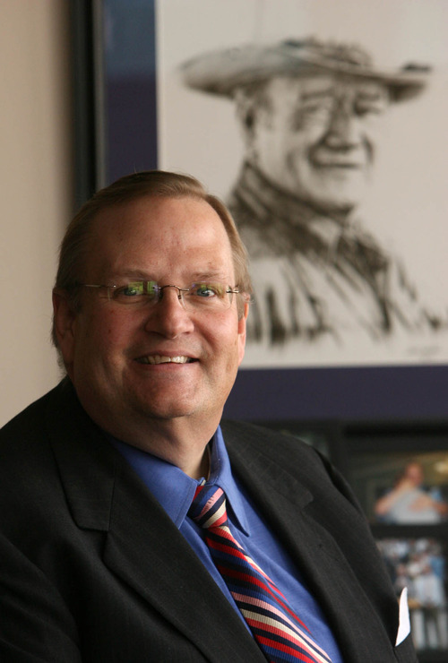 Leah Hogsten  |  The Salt Lake Tribune
Greg Hawkins, Salt Lake County's new auditor, has fought to protect his office's powers.  Hawkins has a picture of John Wayne on his wall that speaks, in part, to his personality during his first months in office.