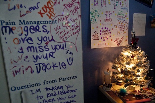 Chris Detrick  |  The Salt Lake Tribune
These are messages written to Megan Birk at by her family and boyfriend at Primary Children's Medical Center in early December. Megan Birk, 18, has survived innumerable impossible medical hurdles. From being born severely premature to leukemia to a heart transplant to a recent bout with tumors. Her mother considers her an angel, filled with good, determined to survive.