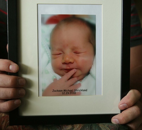 Leah Hogsten  |  The Salt Lake Tribune
Jake Strickland holds the only photo he has of his son, born Dec. 29, 2010, in Murray, and placed for adoption a day later.