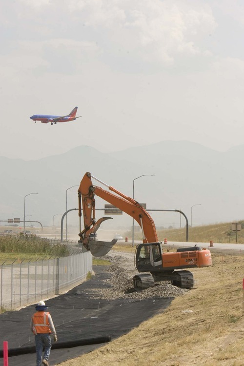 Work begins on the Trax extension to Salt Lake International Airport on  the dedicated corridor  from 2400 West to the airporton  Wednesday, September 2,2009  photo:Paul Fraughton/ The Salt Lake Tribune