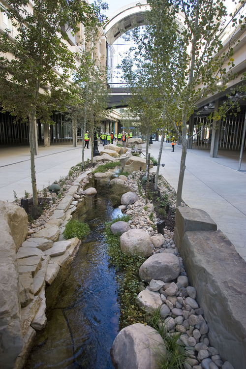 Al Hartmann   |  The Salt Lake Tribune 
A re-creation of City Creek runs through the new City Creek Center. The new shopping and dining destination will transform downtown Salt Lake City with its mix of modern architecture, historic restoration and restored creek. It is opening March 22.