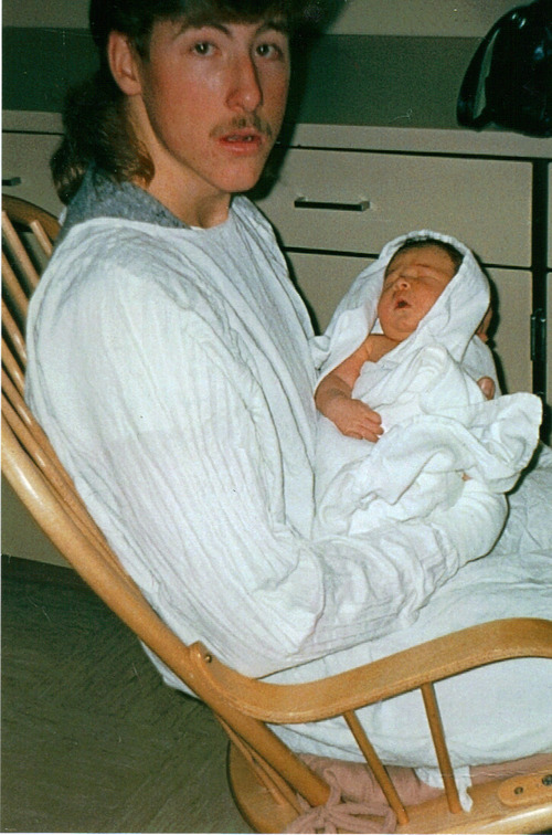 Steve Stone holds his newborn son Kai days after his birth in December 1986 and just before Kai was placed with his adoptive parents. 
Courtesy Steve and Keri Stone