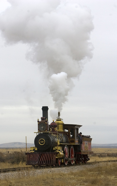 Al Hartmann  |  The Salt Lake Tribune
Union Pacific steam locomotive 199 rolls down the track to the Golden Spike National Historic Site visitor center in northwestern Utah Wednesday on Wednesday, Dec. 28, 2011. Golden Spike holds its annual Winter Steam Festival on December 28-30 Folks can get up close to tour the locomotive cab, see steam demonstrations as well as take a ride on a muscle powered handcart.