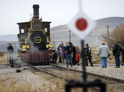 Al Hartmann  |  The Salt Lake Tribune
Folks gather to see Union Pacific steam locomotive 199 at the Golden Spike National Historic Site visitor center in northwestern Utah on Wednesday, Dec. 28, 2011. Golden Spike holds its annual Winter Steam Festival on December 28-30 Folks can get up close to tour the locomotive cab, see steam demonstrations as well as take a ride on a muscle powered handcart.
