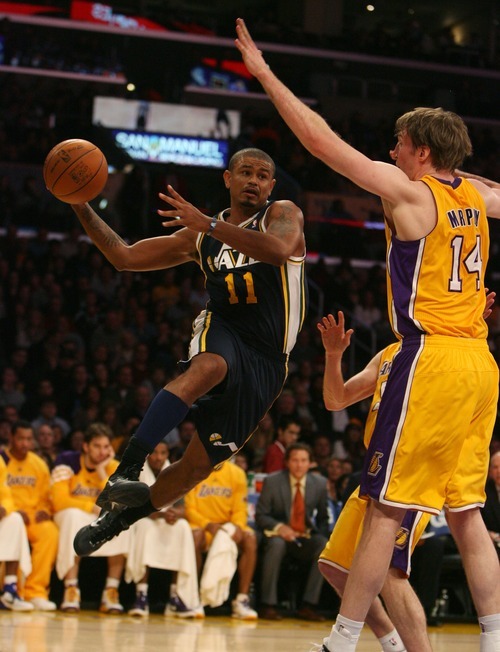 Steve Griffin  |  The Salt Lake Tribune

Utah's Earl Watson drives the baseline during first half action in the Jazz Lakers game at the Staples Center in  in Los Angeles, CA Tuesday, December 27, 2011.