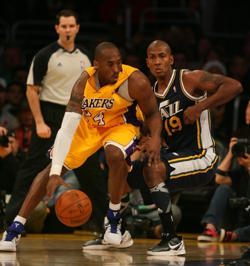 Steve Griffin  |  The Salt Lake Tribune

Utah's Raja Bell guards Kobe Bryant, of the Lakers, during first half action in the Jazz Lakers game at the Staples Center in  in Los Angeles, CA Tuesday, December 27, 2011.