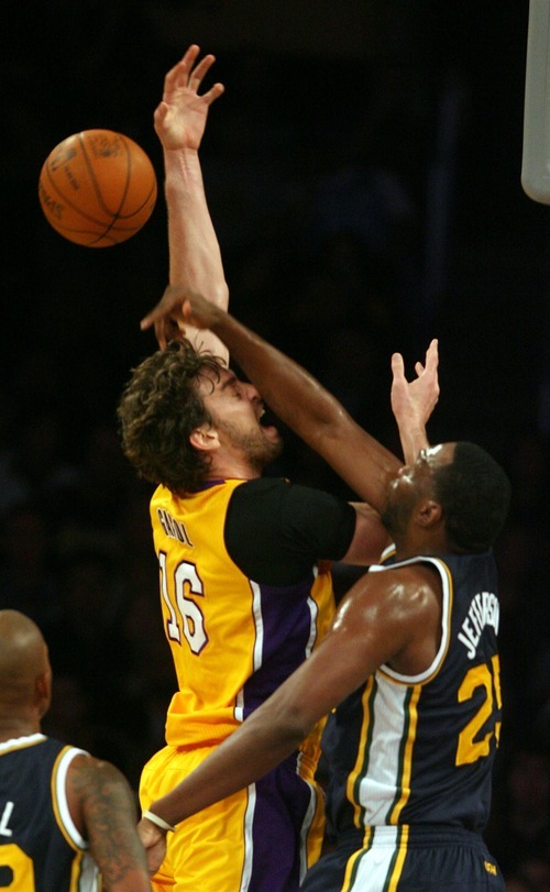 Steve Griffin  |  The Salt Lake Tribune

Utah's Al Jefferson blocks Pau Gasol's shot during first half action in the Jazz Lakers game at the Staples Center in  in Los Angeles, CA Tuesday, December 27, 2011.