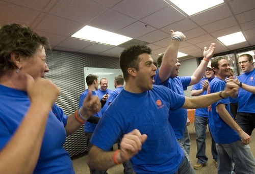 Kim Raff  I  The Salt Lake Tribune
Fishbowl employees celebrate Thursday as the Orem company pays off its $1 million loan from Zions Bank. The money was used to fund an employee buyout of the software company years earlier than expected.