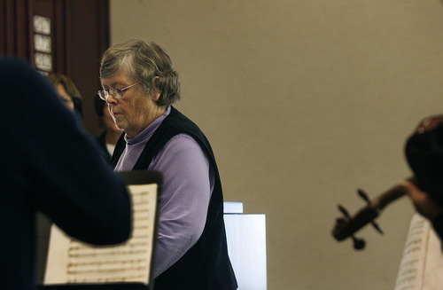 Scott Sommerdorf  |  The Salt Lake Tribune             
Louise Degn leads choir practice at the LDS Foothill 7th Ward, Saturday, Dec. 24, 2011. Degn, a noted journalist, has continued to conduct the choir despite dealing with bone cancer.