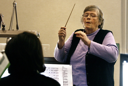 Scott Sommerdorf  |  The Salt Lake Tribune             
Louise Degn leads choir practice at the LDS Foothill 7th Ward, Saturday, Dec. 24, 2011. Degn, a noted journalist, has continued to conduct the choir despite dealing with bone cancer.