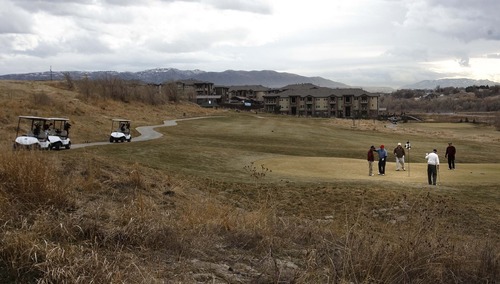 Leah Hogsten | The Salt Lake Tribune  
Golfers on the links at River Oaks Golf Course in Sandy. The Wasatch Front and much of the state are on track for the driest December since weather records have been kept.