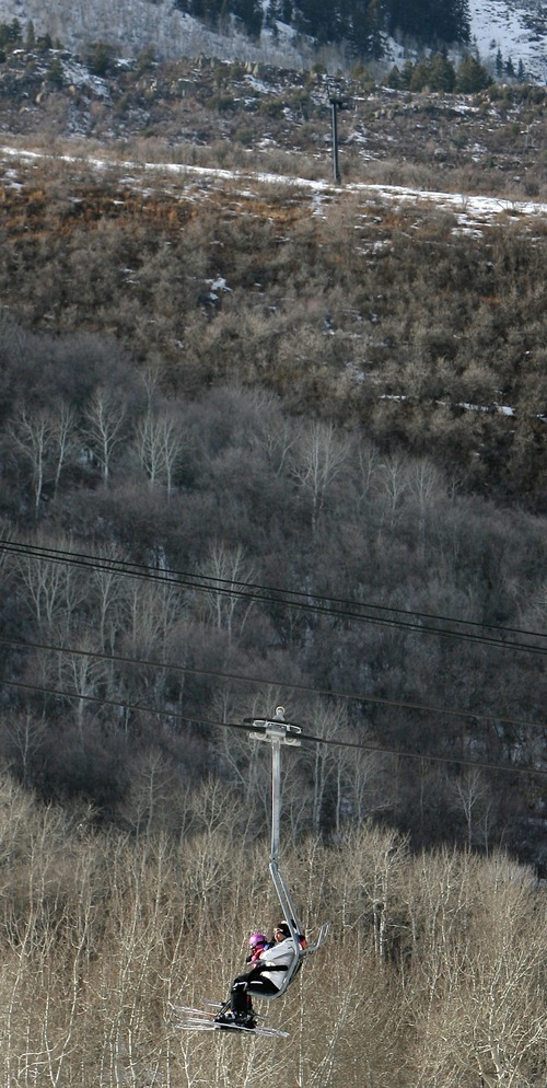 Steve Griffin  |  The Salt Lake Tribune
Skiers ride a chairlift at Park City Mountain Resort in Park City.
