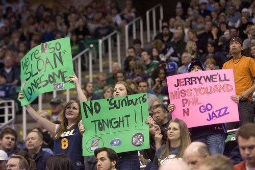 Jeremy Harmon  |  The Salt Lake Tribune

Jazz fans hold up signs saying they'll miss former coaches Jerry Sloan and Phil Johnson as the Jazz face the Phoenix Suns on Friday, February 11, 2011. Tonight was the first game without Jerry Sloan as head coach.
