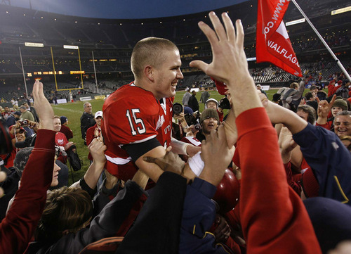 Trent Nelson | The Salt Lake Tribune

Utah quarterback Brett Ratliff is lifted up by fans after Utah defeated Georgia Tech in the Emerald Bowl in San Francisco, California, December 29, 2005.
