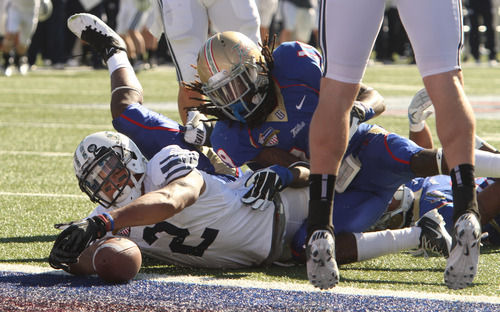 Rick Egan  | The Salt Lake Tribune 

Brigham Young Cougars wide receiver Cody Hoffman (2) stretches into the endzone for a BYU touchdown with 12 seconds left in the first half, in football action in the Armed Forces Bowl, BYU vs. Tulsa, in Dallas, Texas, Friday, December 30, 2011