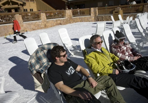 Kim Raff I The Salt Lake Tribune
(from left) Patrick Anderes sits in a t-shirt, with John Abel and Shannon Anderes outside of the Silver Lake Lodge at Deer Valley Resort in Park City, Utah on January 1, 2012.
