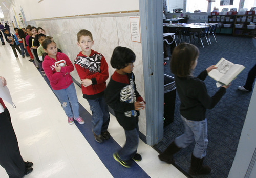 Francisco Kjolseth  |  The Salt Lake Tribune
Third-grade students at Geneva Elementary School in Orem return to Katrina Burgon's class after picking out books at the library on Dec. 6. The Alpine School District is now the state's largest school district, according to newly released enrollment numbers.