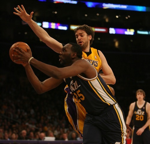 Steve Griffin  |  The Salt Lake Tribune

Utah's All Jefferson drives past Pau Gasol during first half action in the Jazz Lakers game at the Staples Center in  in Los Angeles, CA Tuesday, December 27, 2011.
