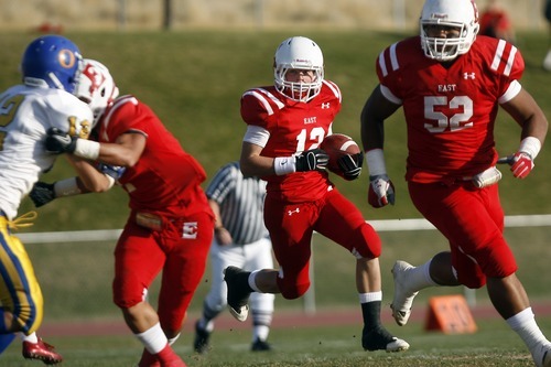 Chris Detrick  |  The Salt Lake Tribune
East's Vaha Vainuku, right, has orally committed to play football at the University of Utah. He is shown here during a game at East High School vs Orem on October 28, 2011.