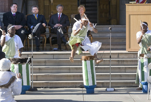 Paul Fraughton | The Salt Lake Tribune.
 Alex Ngendakuriyo, performing with Jambo Africa Burundi Drummers at the swearing-in ceremony Tuesday, Jan. 3, 2012, for Salt Lake City Mayor Ralph Becker and three council members, leaps into the air during a dance for the ceremony.